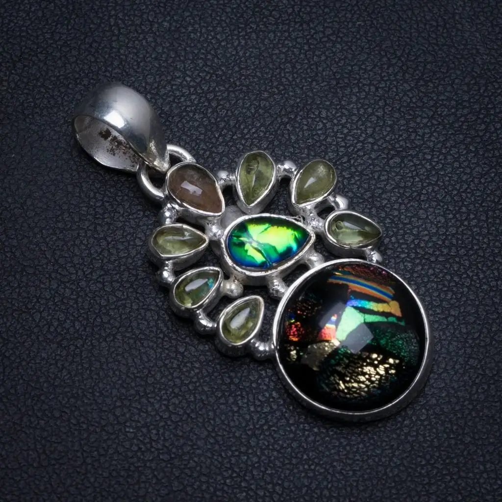 Natural Rainbow Dichroic Glass and Peridot Handmade Mexican 925 Sterling Silver Pendant 1 1/2" T0086
Natural Rainbow Dichroic Glass and Peridot Handmade Mexican 925 Sterling Silver Pendant 1 1/2" T0086