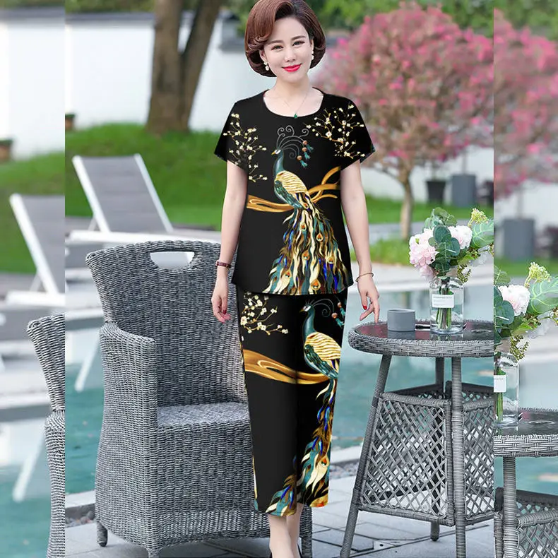 Women 2021 Summer Fashion Printed Two Piece Suits Female Middle-aged Short-sleeved T-shirt Ladies Loose Straight Pants Y23
Women 2021 Summer Fashion Printed Two Piece Suits Female Middle-aged Short-sleeved T-shirt Ladies Loose Straight Pants Y23
