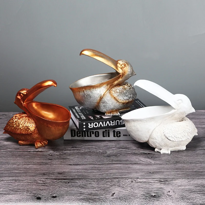 Resin Pelican Statue Key Candy Container for Home Decoration Accessories Storage Table Desk Decor Living Room
Resin Pelican Statue Key Candy Container for Home Decoration Accessories Storage Table Desk Decor Living Room