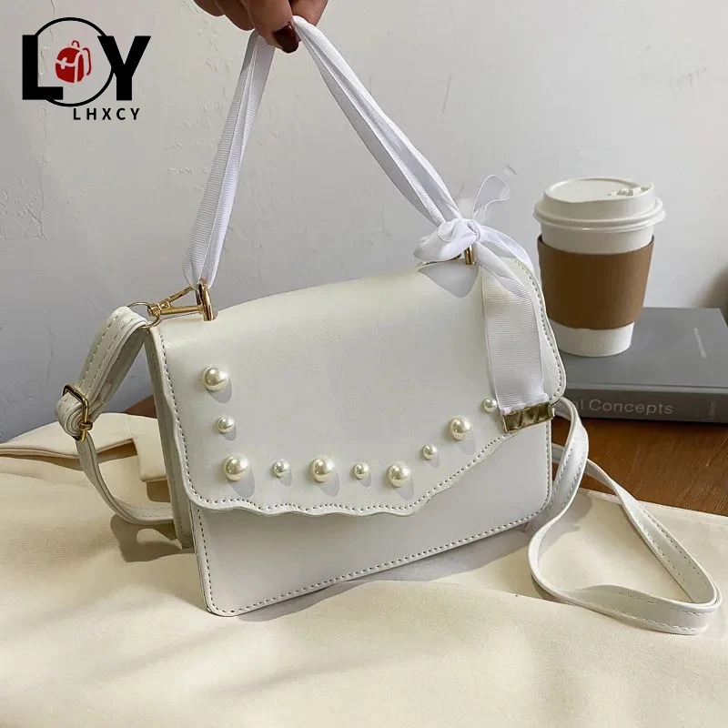 LHXCY Clamshell Bow Pearl Decoration Crossbody Bags High Quality Pu Leather Hasp Luxury Designer Handbag New Travel Designer Bag
LHXCY Clamshell Bow Pearl Decoration Crossbody Bags High Quality Pu Leather Hasp Luxury Designer Handbag New Travel Designer Bag