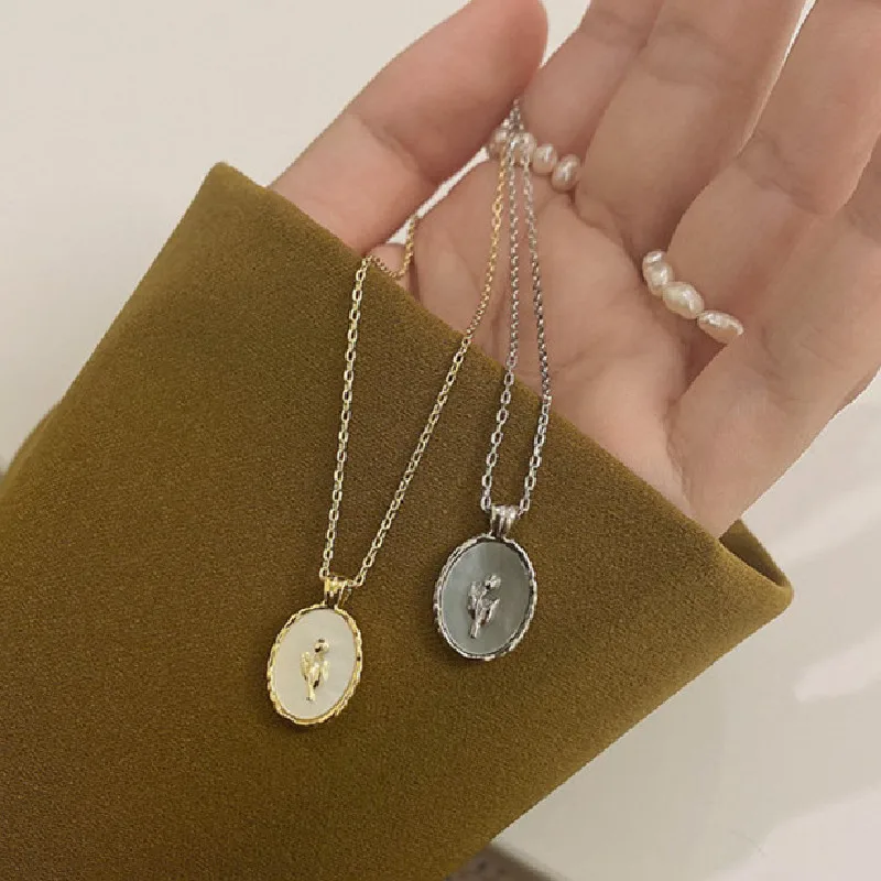 AOMU Spring Simple Gold Silver Color Tulip Flower Pendant Retro Ova Long Thin Chain Necklace for Women Accessories
AOMU Spring Simple Gold Silver Color Tulip Flower Pendant Retro Ova Long Thin Chain Necklace for Women Accessories