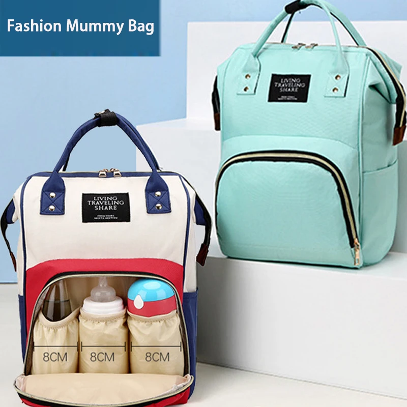 2021 New Handheld Oxford Cloth Mother And Baby Bag Fashion Shoulder Mommy Bag Backpack Large Capacity Mother Bag
2021 New Handheld Oxford Cloth Mother And Baby Bag Fashion Shoulder Mommy Bag Backpack Large Capacity Mother Bag