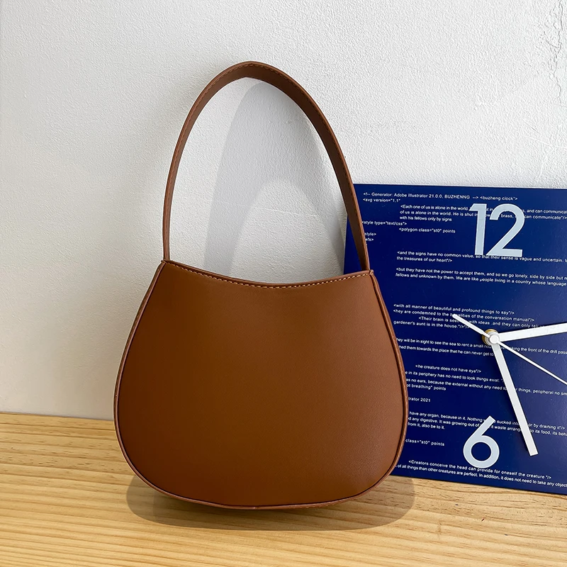 Solid Color Tote Saddle Bag 2021 Summer Fashion New High-quality PU Leather Women's Designer Handbag Small Shoulder Purses
Solid Color Tote Saddle Bag 2021 Summer Fashion New High-quality PU Leather Women's Designer Handbag Small Shoulder Purses