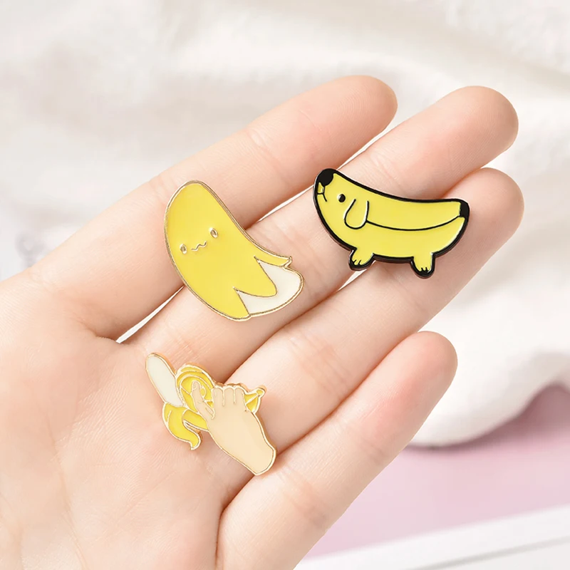 New Fashion Cute Banana pup Dog Enamel pin Set With Gun Brooch Lapel pins Badges Denim Clothes Bags pins Gift for Boys Girls
New Fashion Cute Banana pup Dog Enamel pin Set With Gun Brooch Lapel pins Badges Denim Clothes Bags pins Gift for Boys Girls
