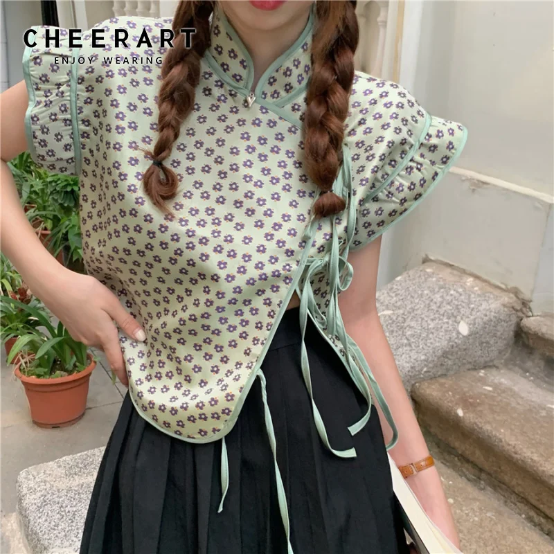 Винтажная зеленая блузка CHEERART без рукавов с оборками, Женский бандажный летний топ и блузка в цветочек, дизайнерская одежда 2021
Винтажная зеленая блузка CHEERART без рукавов с оборками, Женский бандажный летний топ и блузка в цветочек, дизайнерская одежда 2021