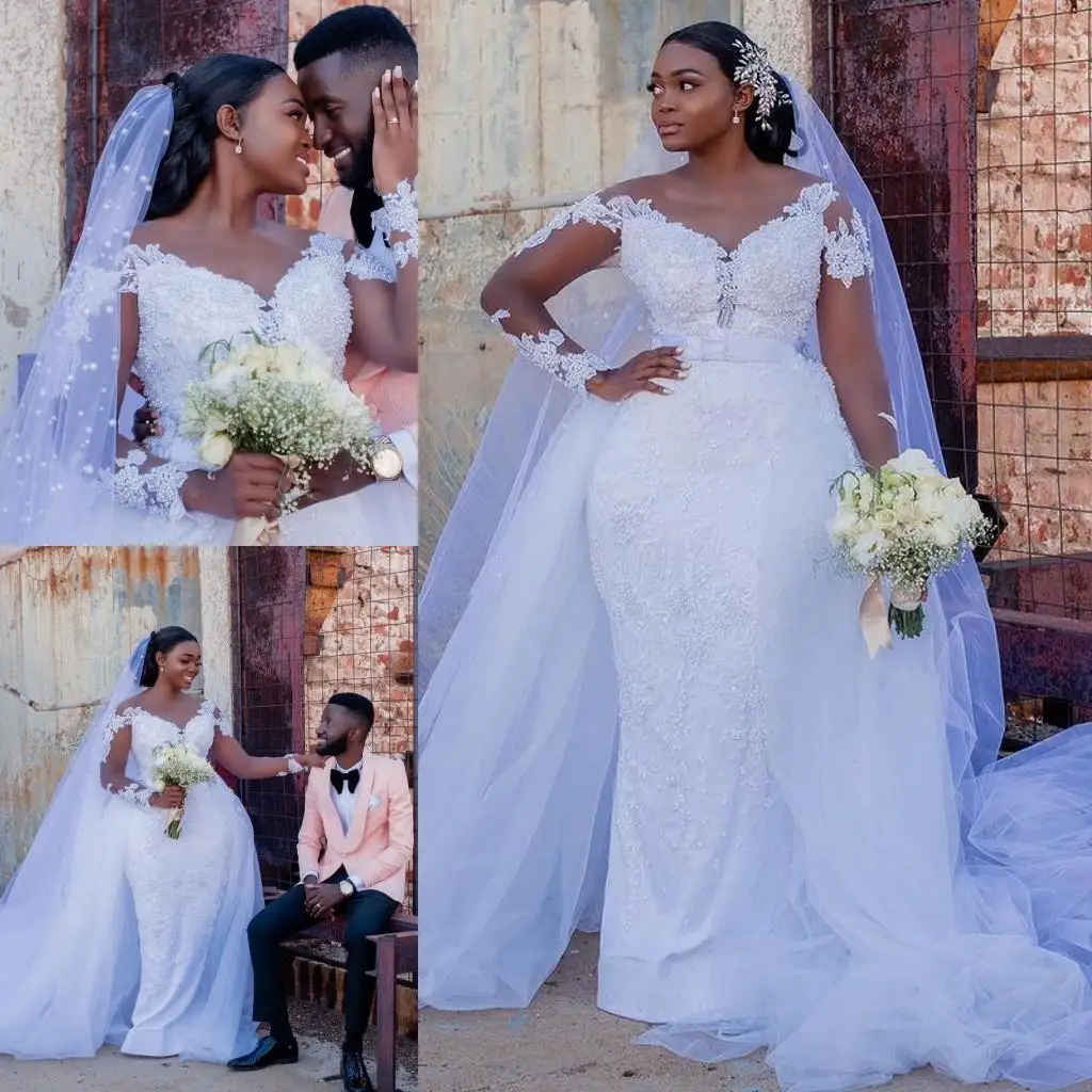 South African Mermaid Wedding Gowns With Detachable Train Sheer Neck Pearls Beaded Long Sleeve Bridal Dresses Lace Appliqued
South African Mermaid Wedding Gowns With Detachable Train Sheer Neck Pearls Beaded Long Sleeve Bridal Dresses Lace Appliqued