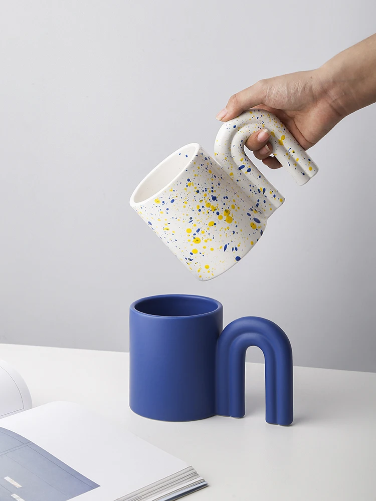 Nordic creative ceramic Klein mug household personality trend large-capacity milk coffee cup
Nordic creative ceramic Klein mug household personality trend large-capacity milk coffee cup
