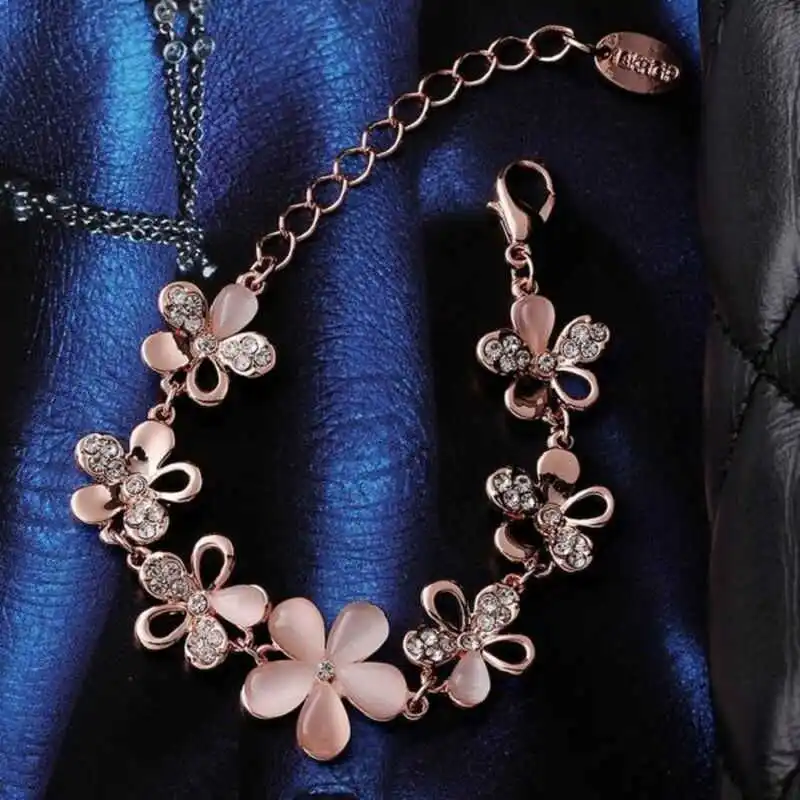 Фото Модный розовый браслет цепочка с опалом и цветком розового золота женский