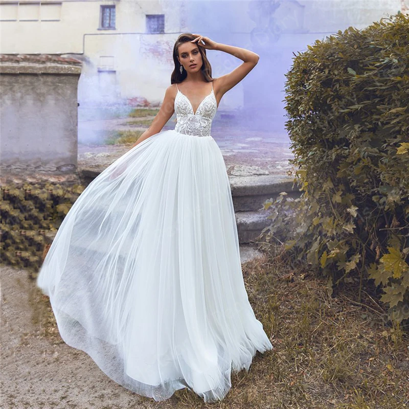 Sexy Spaghetti Straps Illusion Wedding Dresses Vestido De Noiva Pleats Lace Applique Backless Bridal Dresses 2021 V Neck Bride
Sexy Spaghetti Straps Illusion Wedding Dresses Vestido De Noiva Pleats Lace Applique Backless Bridal Dresses 2021 V Neck Bride