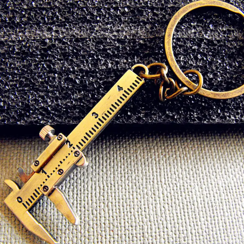 New Fashion Car Key Mini Vernier Caliper Portable 0-40mm keychain Measuring Gauging Tools Car Turbo key Chain Ring Ruler Caliper
New Fashion Car Key Mini Vernier Caliper Portable 0-40mm keychain Measuring Gauging Tools Car Turbo key Chain Ring Ruler Caliper
