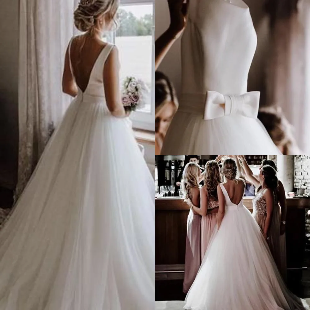 Simple Bateau Neckline Sleeveless A-Line Bohemian Style Wedding Dresses with Bow Low V Back Boho Chic Wedding Dress Cheap
Simple Bateau Neckline Sleeveless A-Line Bohemian Style Wedding Dresses with Bow Low V Back Boho Chic Wedding Dress Cheap
