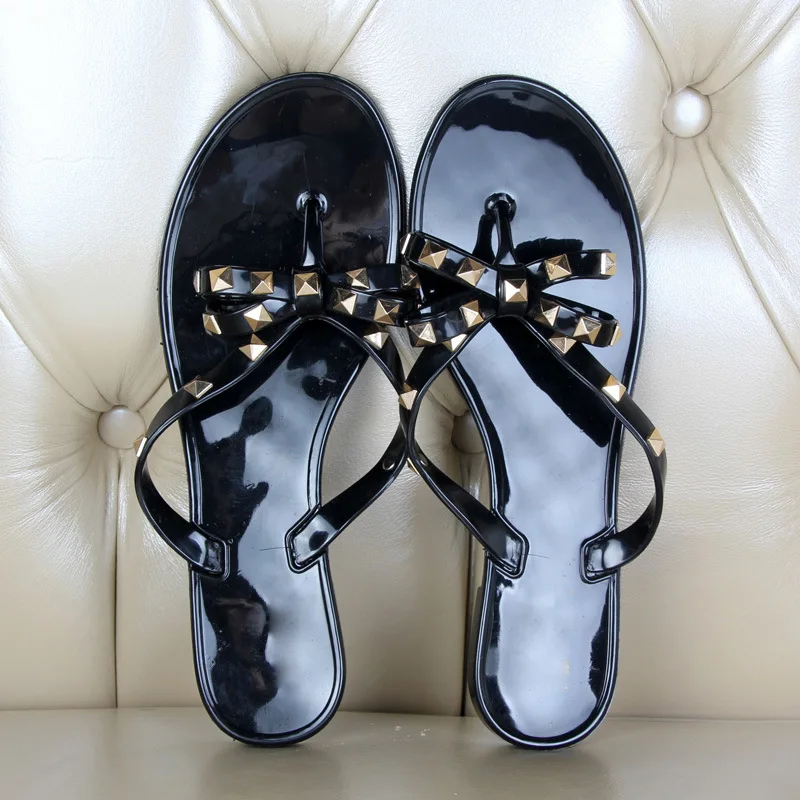 Summer Holiday Rivet Bowknot Flip Flops Girls Beach Slides Women Sandals Slip on Flat Jelly Shoes Women Studs Slippers 2021
Summer Holiday Rivet Bowknot Flip Flops Girls Beach Slides Women Sandals Slip on Flat Jelly Shoes Women Studs Slippers 2021