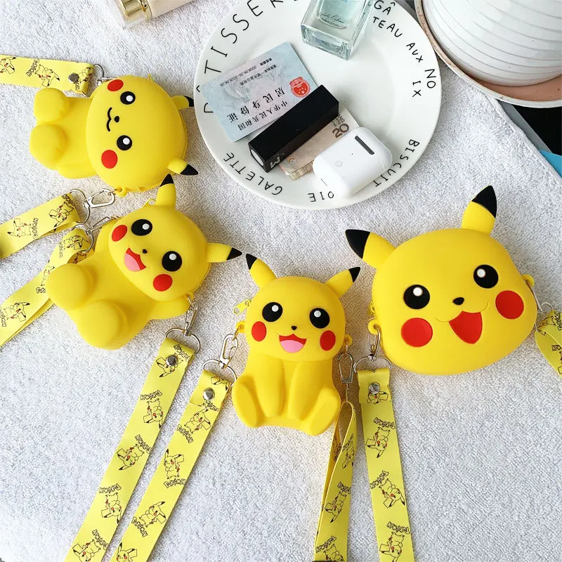Pokemon cartoon coin bag pikaqiu lovely wallet Silica gel girl boy card children holder Clutch kid gift animal figure
Pokemon cartoon coin bag pikaqiu lovely wallet Silica gel girl boy card children holder Clutch kid gift animal figure
