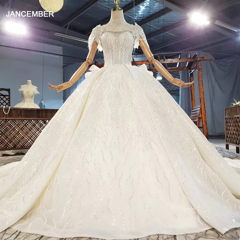 HTL1881 роскошное и элегантное очаровательное свадебное платье с высоким воротником, со стразами и бисером 2020 Бальные платья со съемным длинны...
HTL1881 роскошное и элегантное очаровательное свадебное платье с высоким воротником, со стразами и бисером 2020 Бальные платья со съемным длинны...