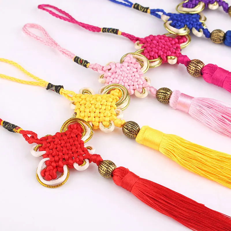 Hand-Knitted Rope Chinese Knot Tassel Fringe Finished Product Car Pendant Small Hanging Ornament Gold Lanyard Decoration
Hand-Knitted Rope Chinese Knot Tassel Fringe Finished Product Car Pendant Small Hanging Ornament Gold Lanyard Decoration