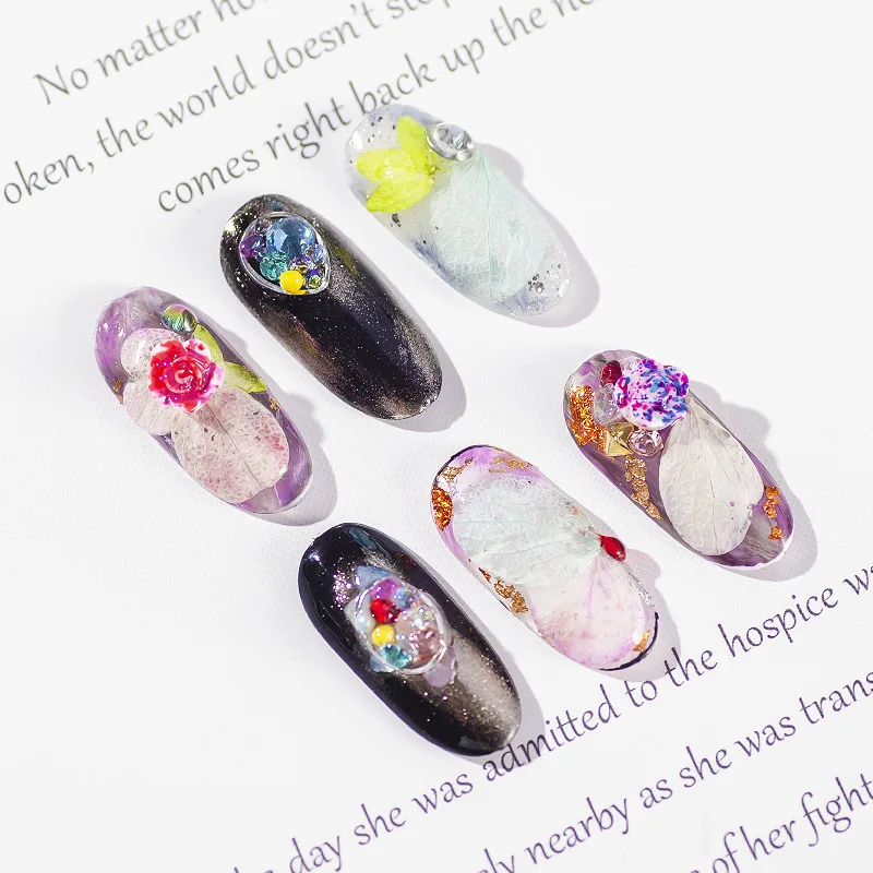 Mix Shapes Glitter Diamond Pearls Metal Beads Dried Flower Nail Art Rhinestones Decorations Gems Decals Manicure DIY Tips 2022
Mix Shapes Glitter Diamond Pearls Metal Beads Dried Flower Nail Art Rhinestones Decorations Gems Decals Manicure DIY Tips 2022