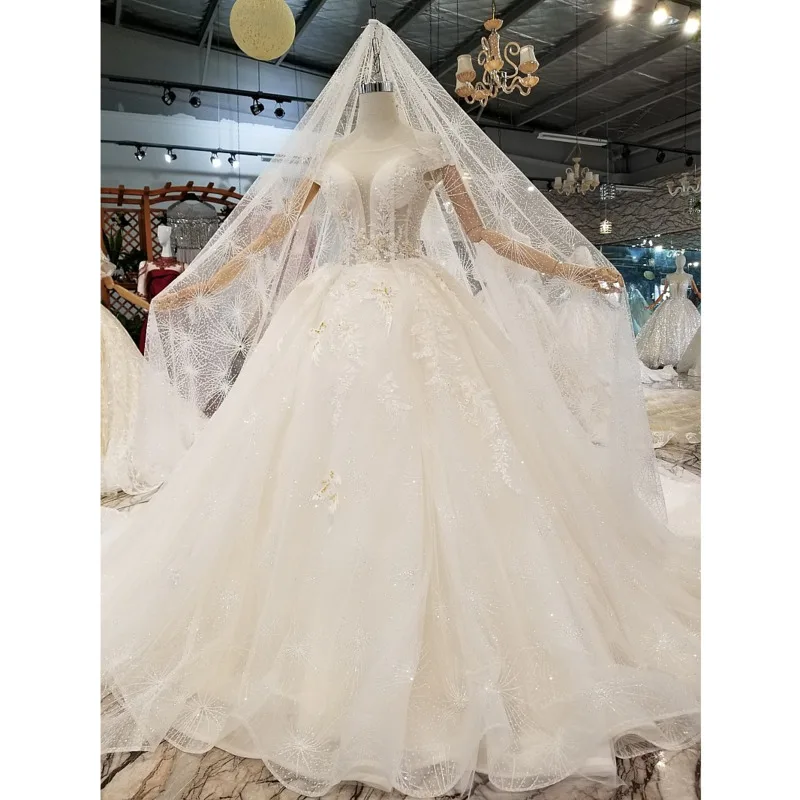 BGW HT4820 Wedding Dress Ball Gown Short Sleeve Lace Beaded Sexy Illusion Wedding Gown With Veil Robe De Mariée Princesse
BGW HT4820 Wedding Dress Ball Gown Short Sleeve Lace Beaded Sexy Illusion Wedding Gown With Veil Robe De Mariée Princesse