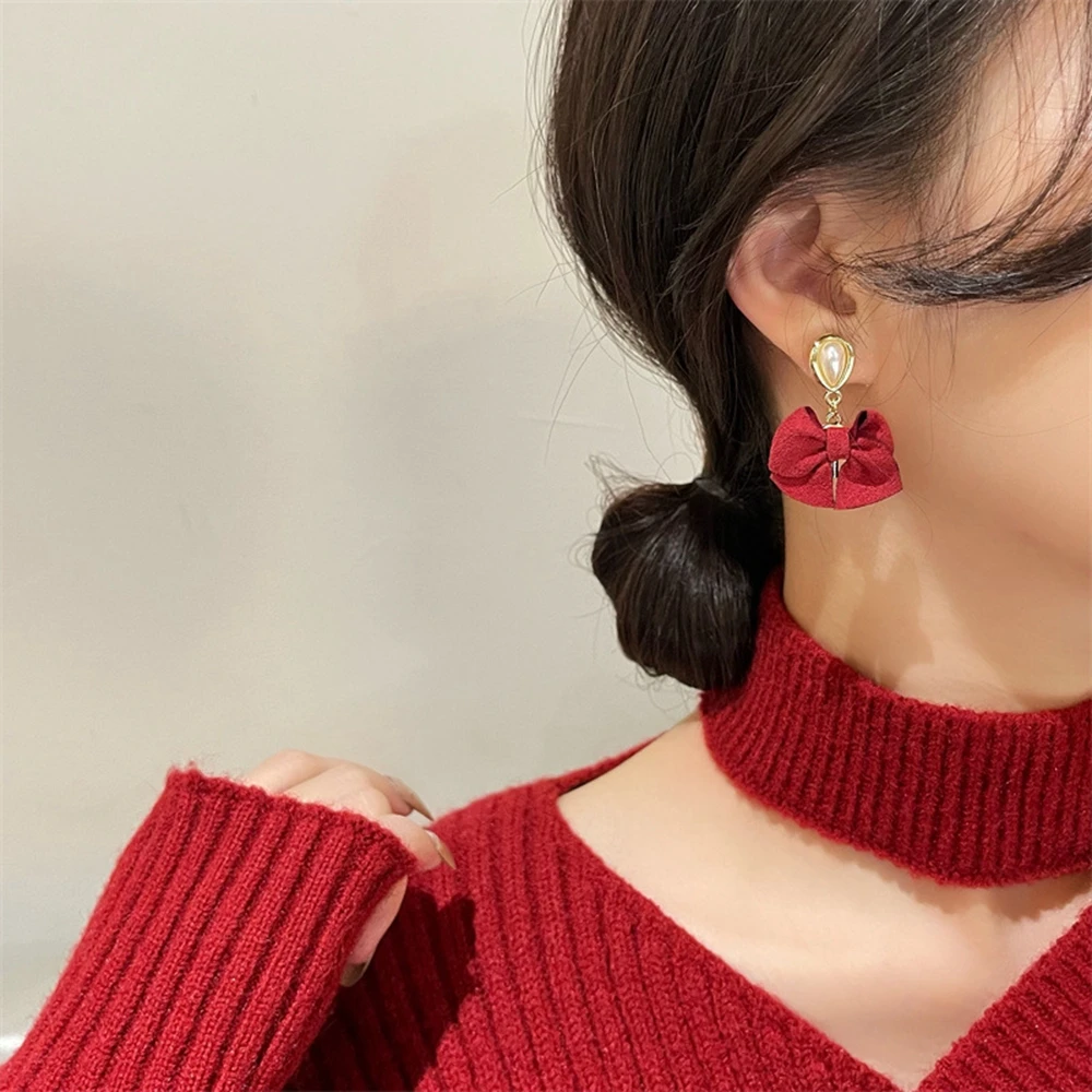 Red Bowknot Pendant Stud Earrings Female Autumn Winter Retro French Pearl Exquisite Elegant Earrings Jewelry for Women
Red Bowknot Pendant Stud Earrings Female Autumn Winter Retro French Pearl Exquisite Elegant Earrings Jewelry for Women