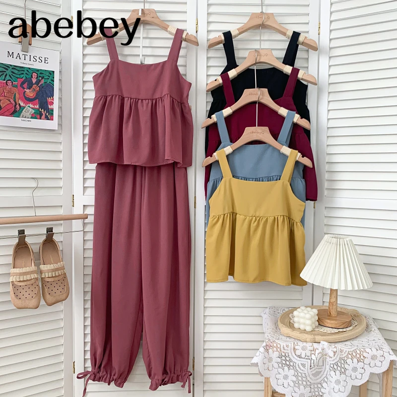 Fashion sleeveless Ruffles short Vest Top + high waist pleated waist casual wide leg bandage Pants 2-piece set 2021 New Summer
Fashion sleeveless Ruffles short Vest Top + high waist pleated waist casual wide leg bandage Pants 2-piece set 2021 New Summer