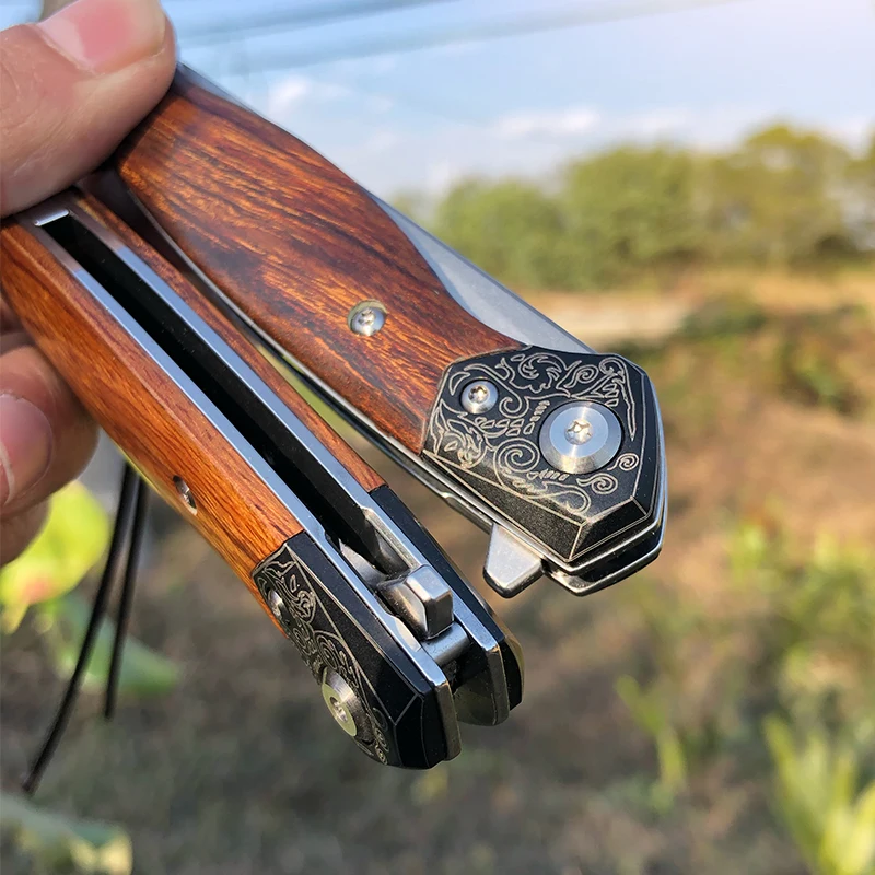 M390 folding knife EDC self-defense knife with sand-iron wood handle, used for outdoor survival camping portable folding knife
M390 folding knife EDC self-defense knife with sand-iron wood handle, used for outdoor survival camping portable folding knife
