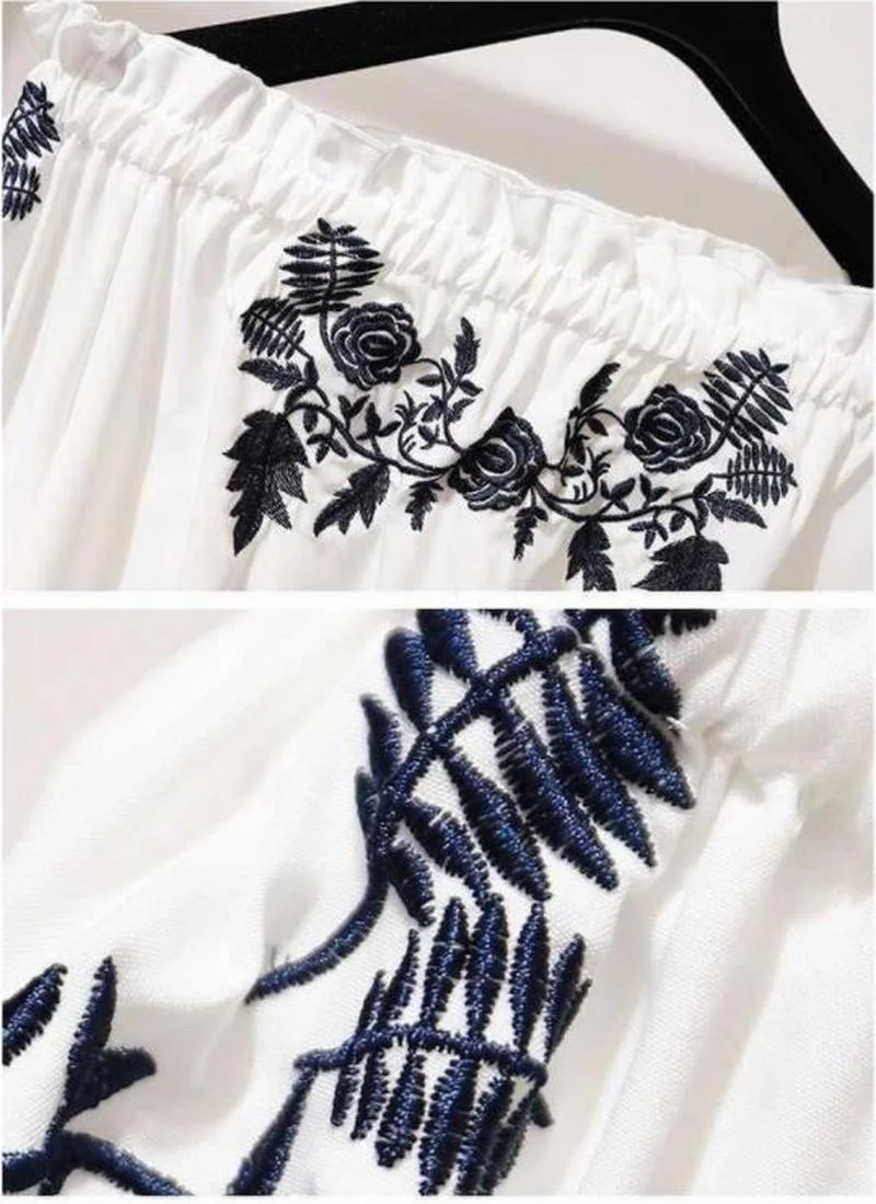 Elegant retro women's dress two-piece Korean version of the white rose embroidery Tshirt black high waist slim irregular dress
Elegant retro women's dress two-piece Korean version of the white rose embroidery Tshirt black high waist slim irregular dress