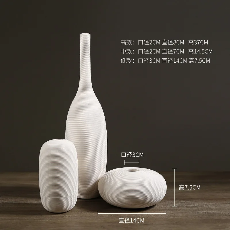 Modern zen zen ceramic flower vase table creative flower ornaments model room porch wine cabinet personality decoration 
Modern zen zen ceramic flower vase table creative flower ornaments model room porch wine cabinet personality decoration