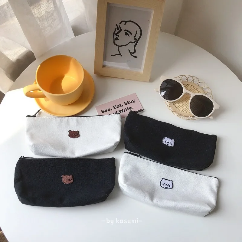 Simple Embroidered Canvas Triangle Pencil Case Cute Couple Stationery Storage Bag Bear Pencil Bag Pencil Case
Simple Embroidered Canvas Triangle Pencil Case Cute Couple Stationery Storage Bag Bear Pencil Bag Pencil Case