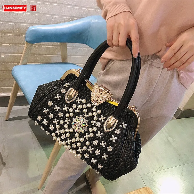 Luxury fashion diamond women handbag female rhinestone pearl shoulder messenger butterfly Hasp bag ladies portable party bags
Luxury fashion diamond women handbag female rhinestone pearl shoulder messenger butterfly Hasp bag ladies portable party bags