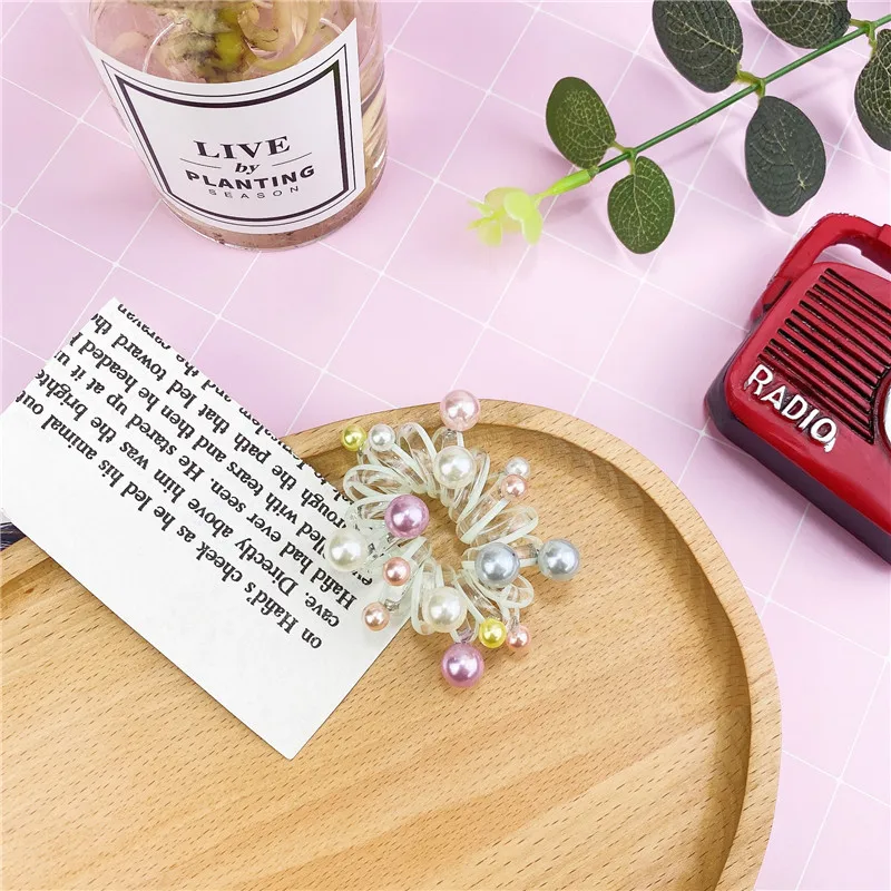 New Hair Rings with Colorful Pearls Elastic Plastic Rubber Band Cute Telephone Wire Ponytail Holder Hair Accessories Scrunchies
New Hair Rings with Colorful Pearls Elastic Plastic Rubber Band Cute Telephone Wire Ponytail Holder Hair Accessories Scrunchies