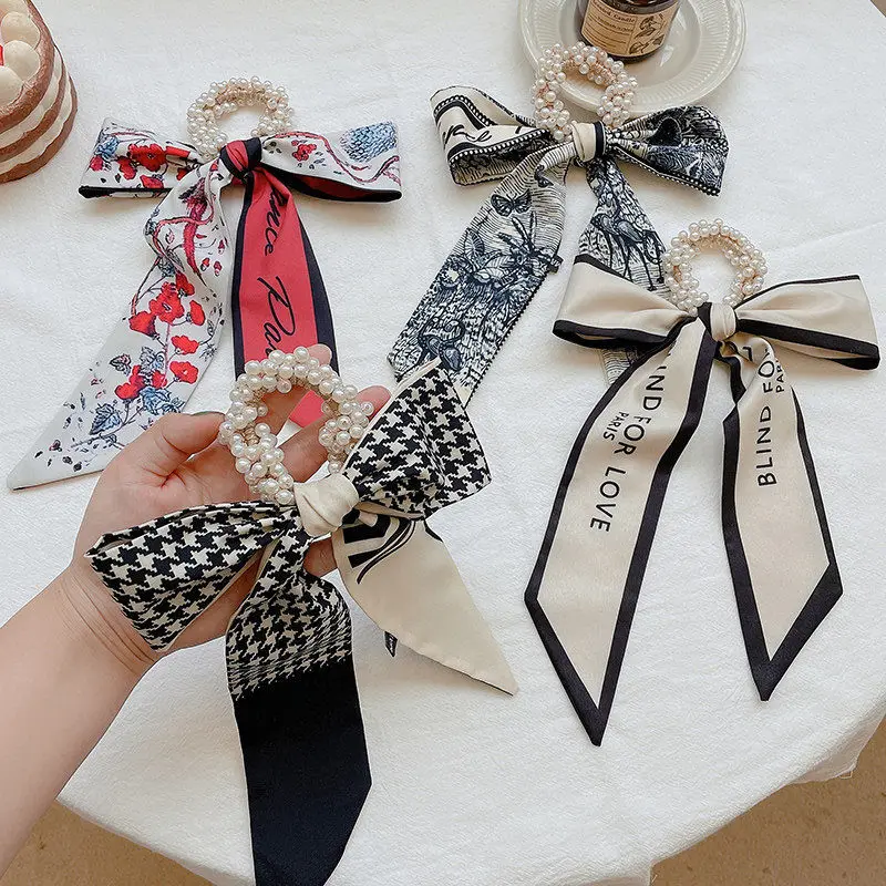 New Fashion The new net red hair ribbon tie hair scarf Pearl hair rope woman tied hair ribbon bow hair braid Hair, headwear
New Fashion The new net red hair ribbon tie hair scarf Pearl hair rope woman tied hair ribbon bow hair braid Hair, headwear