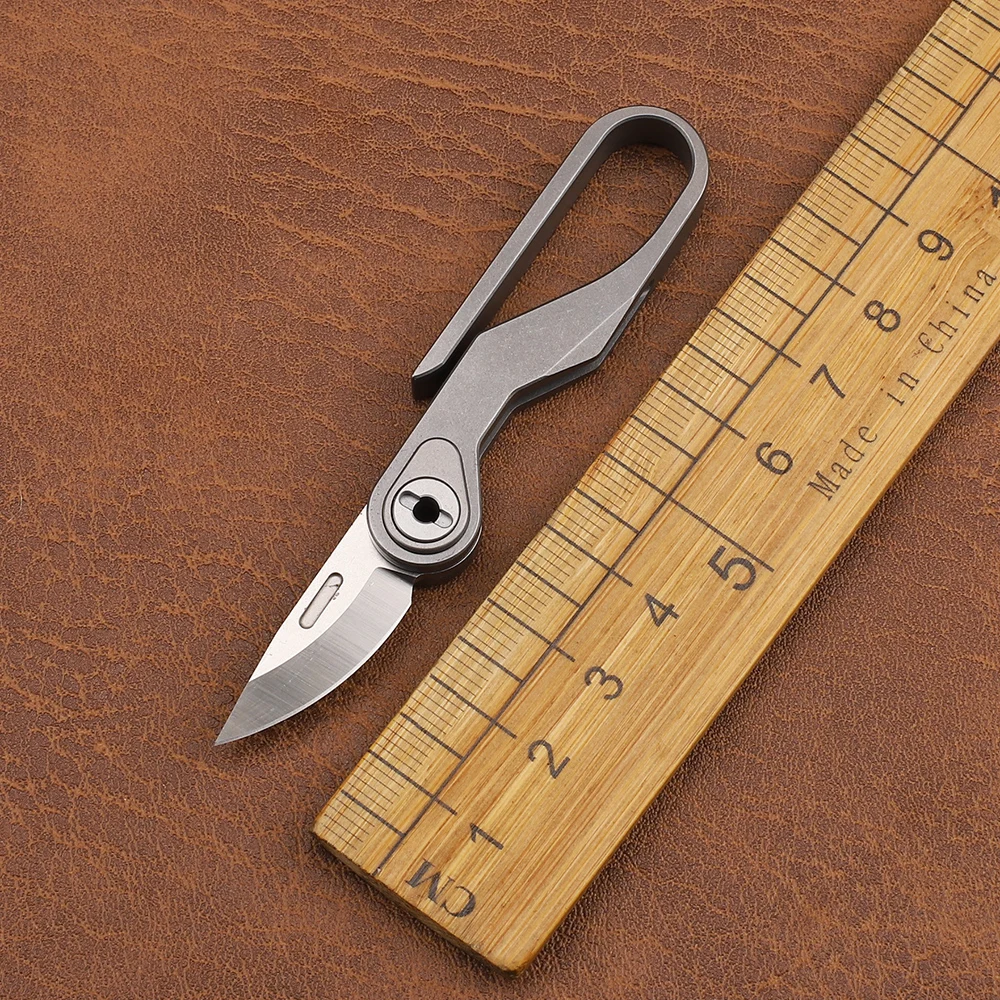 Новинка M390 лезвие мини TC4 ручка из титанового сплава брелок Портативный походный многофункциональный фруктовый инструмент для повседневного использования складной нож 
Новинка M390 лезвие мини TC4 ручка из титанового сплава брелок Портативный походный многофункциональный фруктовый инструмент для повседневного использования складной нож