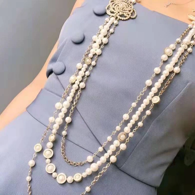 Multi-layers Simulated Pearl Long Necklace Camellia Crystal Sweater Charm Necklace for Women Brand Jewelry Gold Plated on Brass
Multi-layers Simulated Pearl Long Necklace Camellia Crystal Sweater Charm Necklace for Women Brand Jewelry Gold Plated on Brass