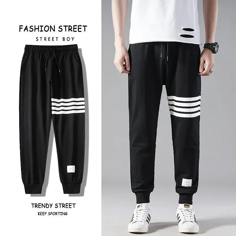 95 cotton spring and summer thin sports pants men's straight tube Chao brand printing casual small foot running pants slim
95 cotton spring and summer thin sports pants men's straight tube Chao brand printing casual small foot running pants slim