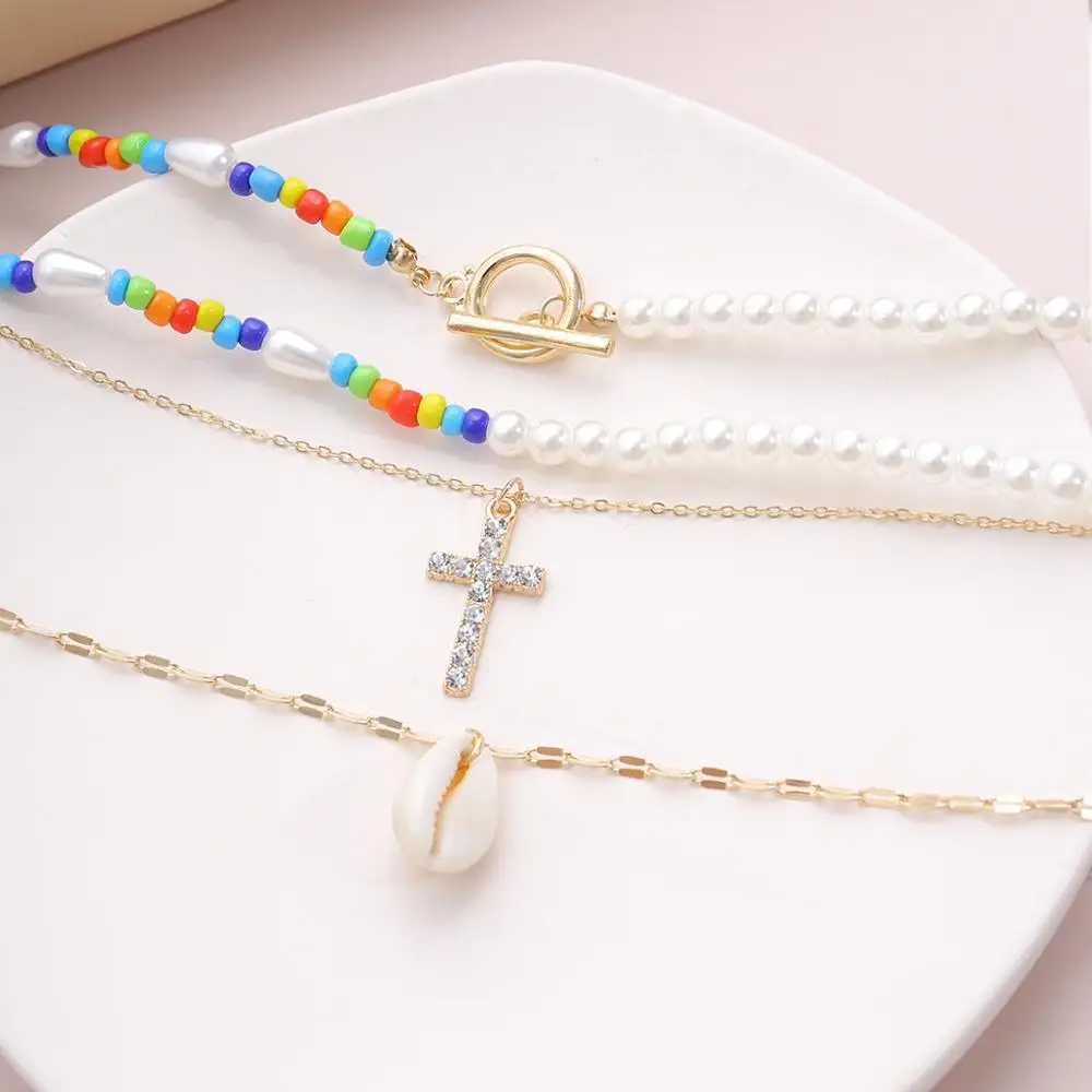 IngeSight.Z 3Pcs/Set Multi Layer Rainbow Seed Bead Imitation Pearl Choker Necklace Crystal Cross Shell Pendant Necklace Jewelry
IngeSight.Z 3Pcs/Set Multi Layer Rainbow Seed Bead Imitation Pearl Choker Necklace Crystal Cross Shell Pendant Necklace Jewelry