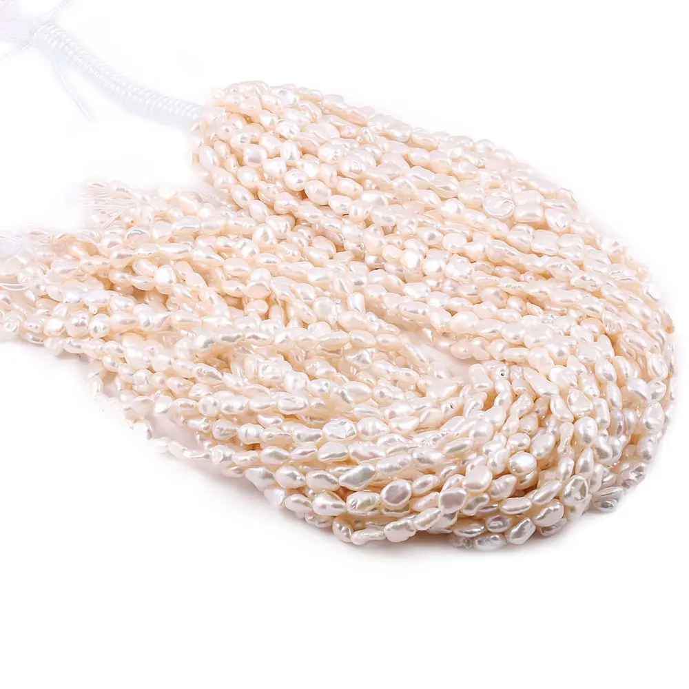 New natural freshwater pearl white and pink irregular pearl beads used for jewelry making DIY bracelet necklace size 9x14mm
New natural freshwater pearl white and pink irregular pearl beads used for jewelry making DIY bracelet necklace size 9x14mm