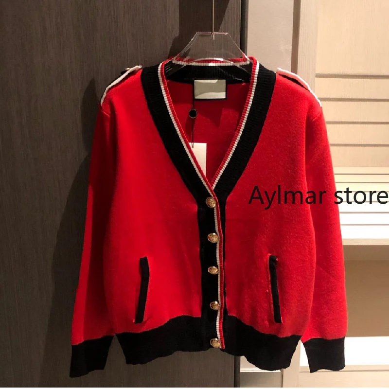 High quality 2021 autumn winter new temperament women's contrast color long sleeved cardigan short knitted sweater coat
High quality 2021 autumn winter new temperament women's contrast color long sleeved cardigan short knitted sweater coat