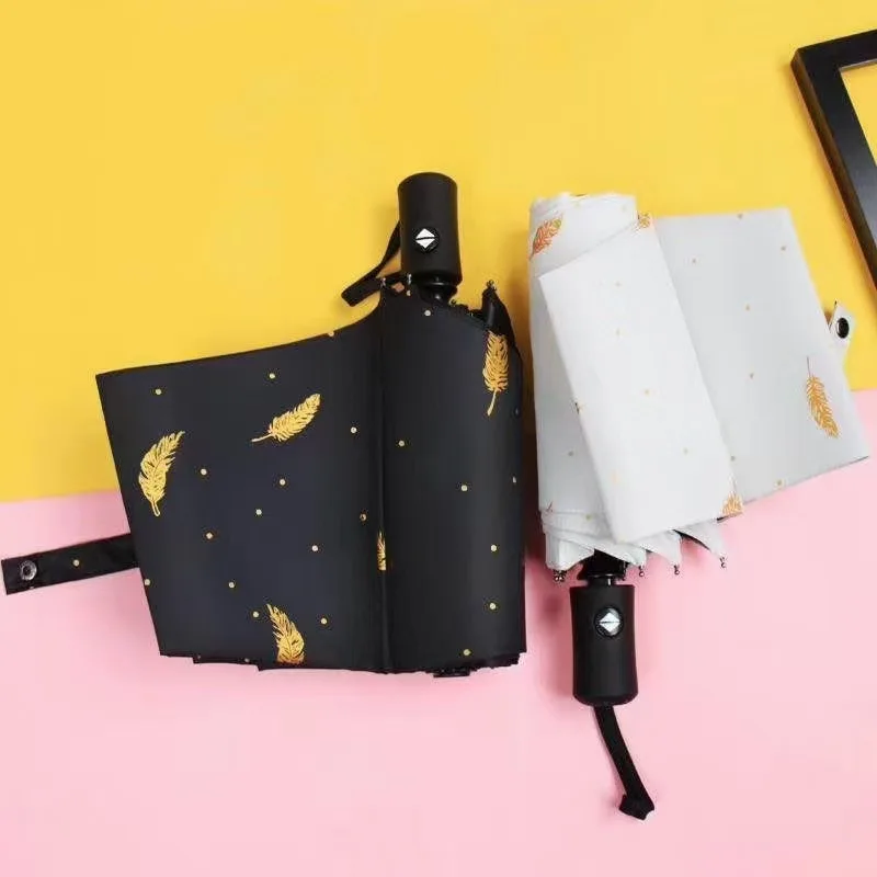 Bronzing Feather Tri-folding Umbrella Lovers Black Plastic Automatic Folding Umbrella Rain And Sun Dual-use Windproof Umbrella
Bronzing Feather Tri-folding Umbrella Lovers Black Plastic Automatic Folding Umbrella Rain And Sun Dual-use Windproof Umbrella