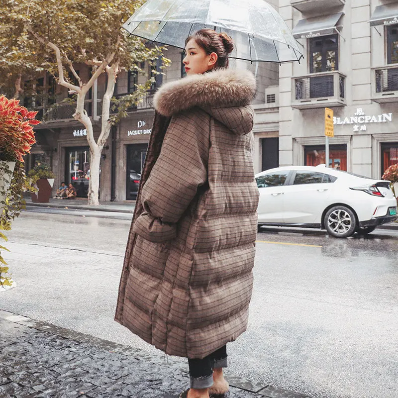 Winter new style Korean bread coat padded jacket big fur collar over the knee thick plaid down padded coat women mid-length
Winter new style Korean bread coat padded jacket big fur collar over the knee thick plaid down padded coat women mid-length