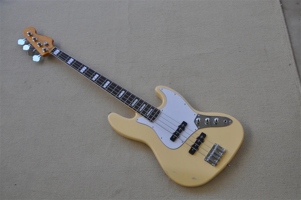 Factory store cream color 4 string Jazz Bass electric bass guitar real photos in stock 41
Factory store cream color 4 string Jazz Bass electric bass guitar real photos in stock 41
