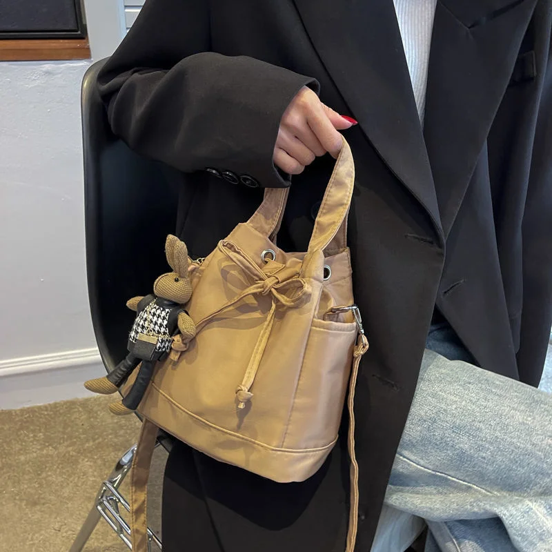 Bucket bag 2022 new one Shoulder Messenger Handbag cute small cylinder bag Japanese and Korean drawstring bag hand bag
Bucket bag 2022 new one Shoulder Messenger Handbag cute small cylinder bag Japanese and Korean drawstring bag hand bag