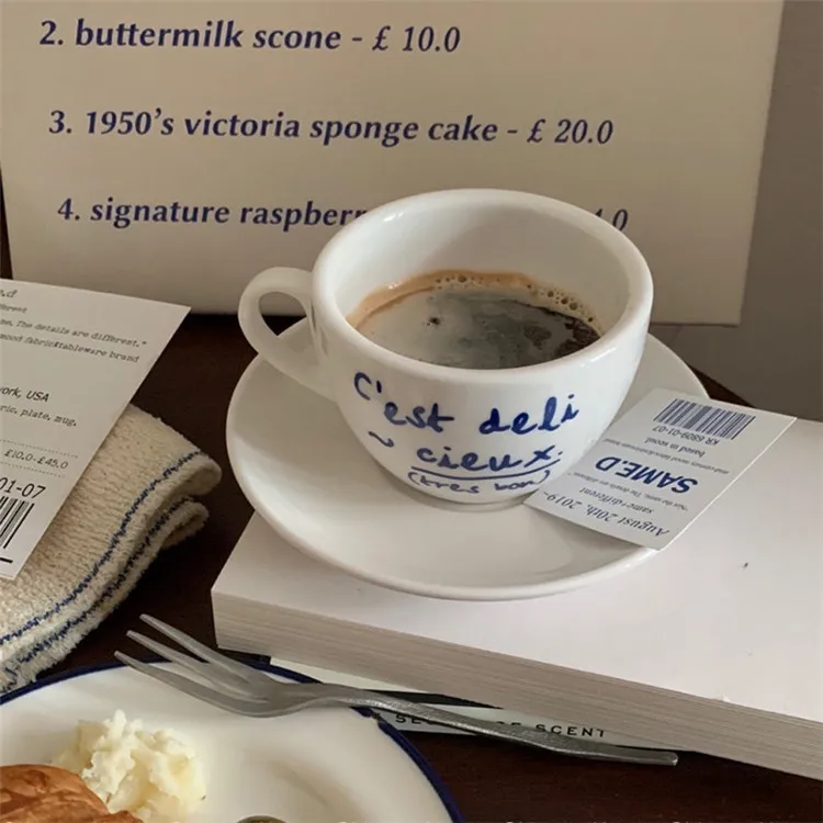 2PCS Korean Style Niche Coffee Shop Simple Blue Letter Ceramic Mug and Saucer Set French Retro Romantic Milk Cup Drinkware Gifts 
2PCS Korean Style Niche Coffee Shop Simple Blue Letter Ceramic Mug and Saucer Set French Retro Romantic Milk Cup Drinkware Gifts