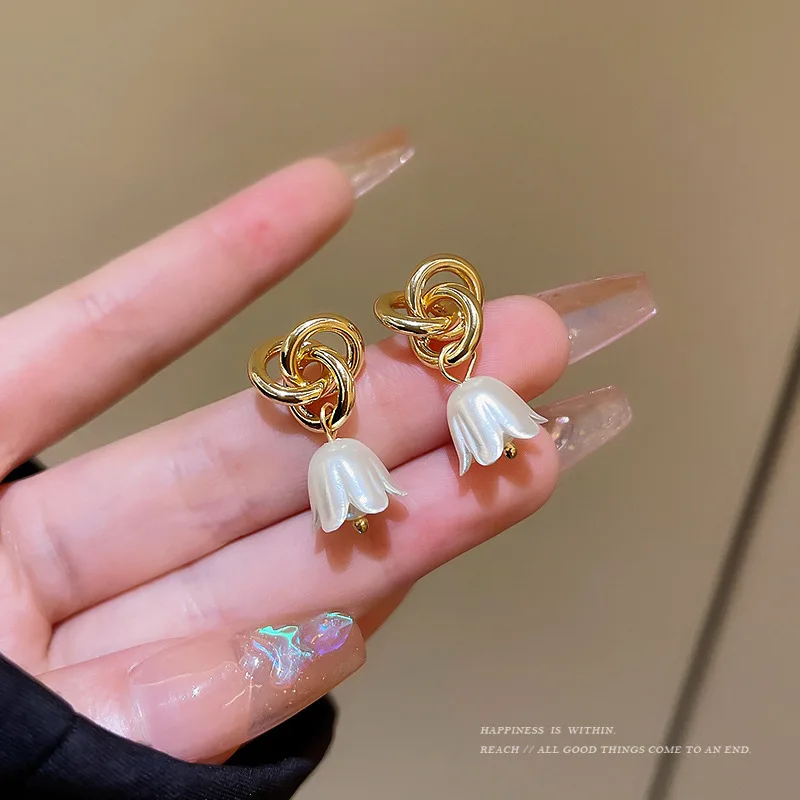 S925 Silver Needle Simple Knotted Lily Of The Valley Flower Earrings Feminine Temperament Ins Style Niche Design Ear Jewelry
S925 Silver Needle Simple Knotted Lily Of The Valley Flower Earrings Feminine Temperament Ins Style Niche Design Ear Jewelry