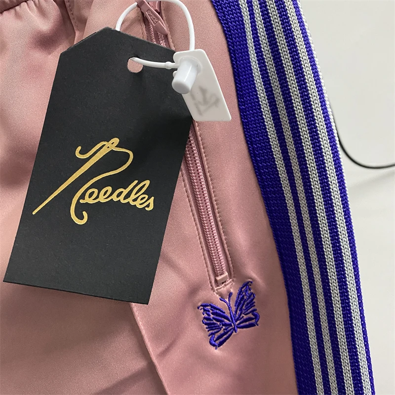 23SS New Fasion Needles Sweatpants Men Women Top Quality Track Pants Narrow Blue Stripe Butterfly AWGE Trousers Lil Peep
23SS New Fasion Needles Sweatpants Men Women Top Quality Track Pants Narrow Blue Stripe Butterfly AWGE Trousers Lil Peep