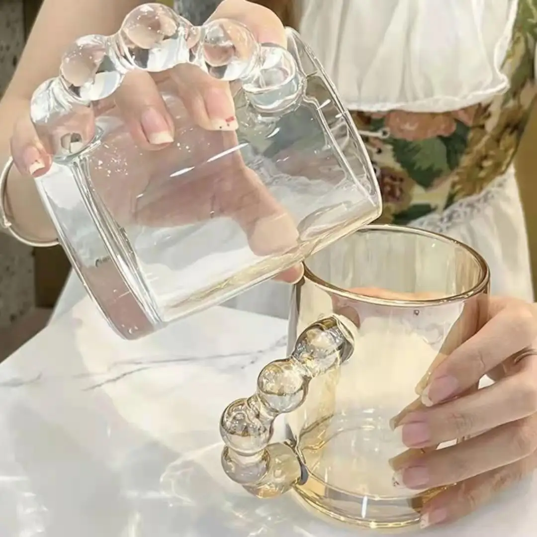 Iridescent Glass Cup Coffee Mug Big Ball Handle Transparent Glass Water Cup Mugs Dessert Coffee Water Cups Drinkware Tableware
Iridescent Glass Cup Coffee Mug Big Ball Handle Transparent Glass Water Cup Mugs Dessert Coffee Water Cups Drinkware Tableware