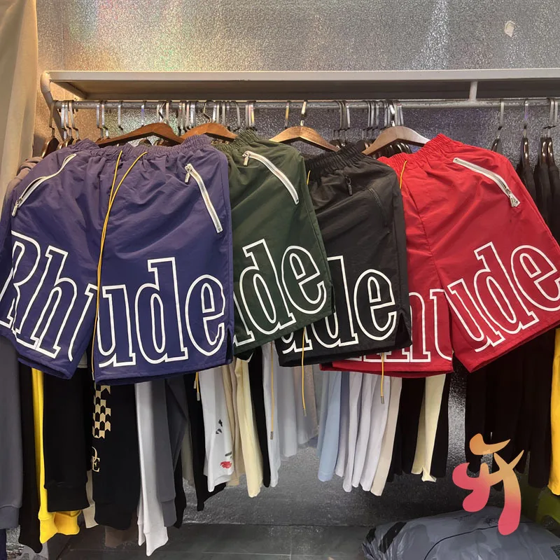 Real Photos Rhude Shorts Logo Print Zipper Pocket Multicolor Sweatpants Loose Drawstring Beach Casual High Quality Short Pants
Real Photos Rhude Shorts Logo Print Zipper Pocket Multicolor Sweatpants Loose Drawstring Beach Casual High Quality Short Pants