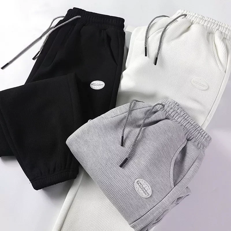 New2022 Fashion Female Spring Waffle Casual Pants All-match Large Size High Street Couple style Loose Straight Sports Trousers
New2022 Fashion Female Spring Waffle Casual Pants All-match Large Size High Street Couple style Loose Straight Sports Trousers