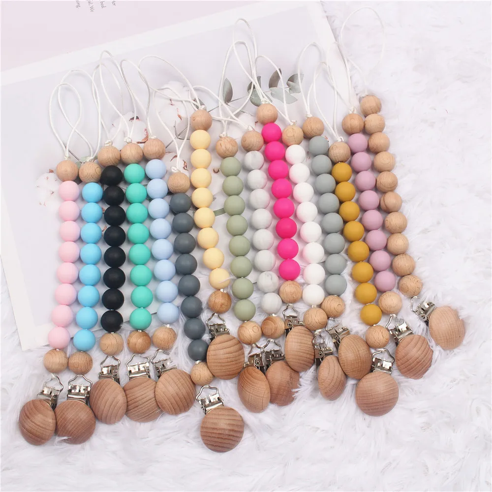 Silicone Baby Wooden Teething Chain Teether Pacifier Clip Holder Pacifier Pendant Teether Anti-drop Chains Baby Teething Toy
Silicone Baby Wooden Teething Chain Teether Pacifier Clip Holder Pacifier Pendant Teether Anti-drop Chains Baby Teething Toy