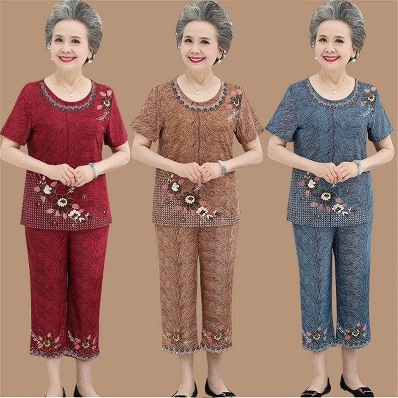 Summer Milk silk short-sleeved suit middle-aged women plus size print tops +pants suit grandmother loose 2 pieces suits
Summer Milk silk short-sleeved suit middle-aged women plus size print tops +pants suit grandmother loose 2 pieces suits