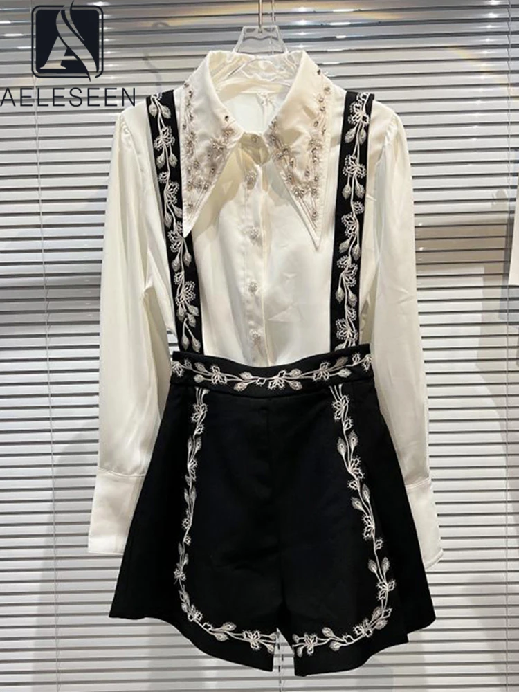 AELESEEN Fashion Designer 2022 Spring Summer 2 Pieces Set Women Beading Flower Embroidery Shirt+Black Straps Shorts Set
AELESEEN Fashion Designer 2022 Spring Summer 2 Pieces Set Women Beading Flower Embroidery Shirt+Black Straps Shorts Set