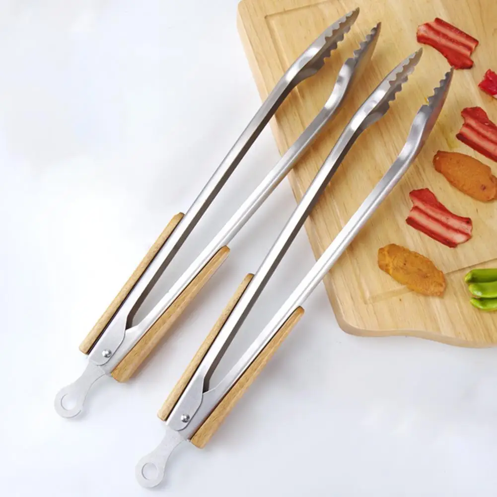 1PC Food Tong Anti-slip Comfortable Grip Stainless Steel Handheld Grill Barbecue Anti-scalding Clip BBQ Tool Kitchen Gadget
1PC Food Tong Anti-slip Comfortable Grip Stainless Steel Handheld Grill Barbecue Anti-scalding Clip BBQ Tool Kitchen Gadget